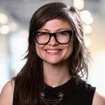 headshot of woman with glasses