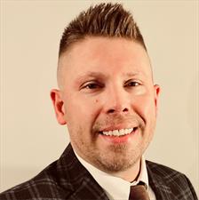 Headshot of Eric Johnson, manager at YPTC and one of the members of our Social Services specialization that serves social service and multiservice organizations